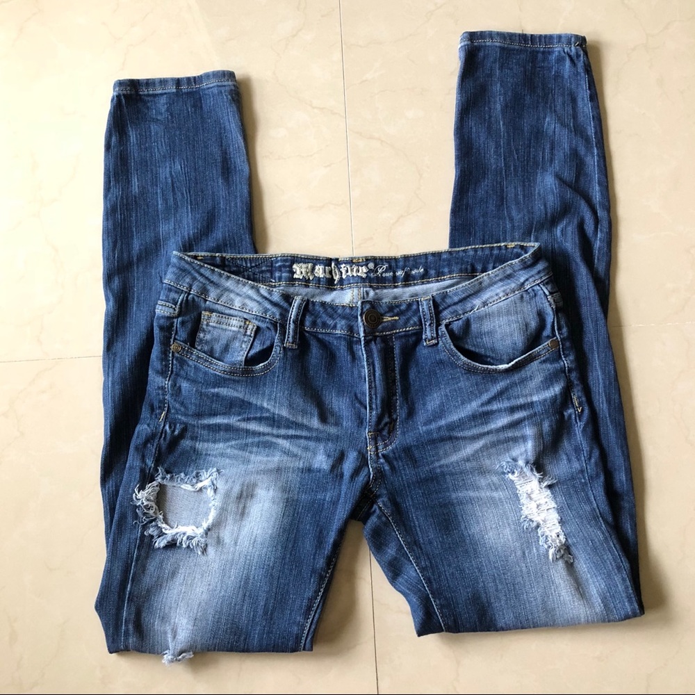 Machine distressed skinny jeans 11/12